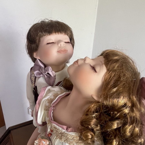 Cute porcelain doll couple boy and girl in box, vintage