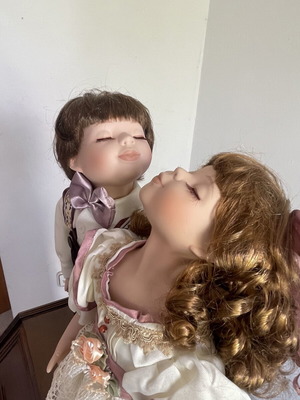 Cute porcelain doll couple boy and girl in box, vintage