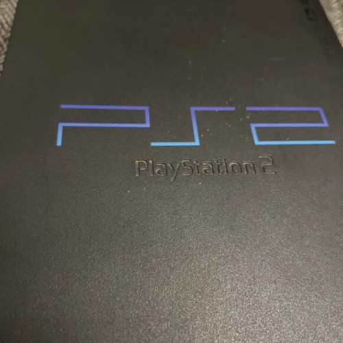 PlayStation 2 used with cables and functional