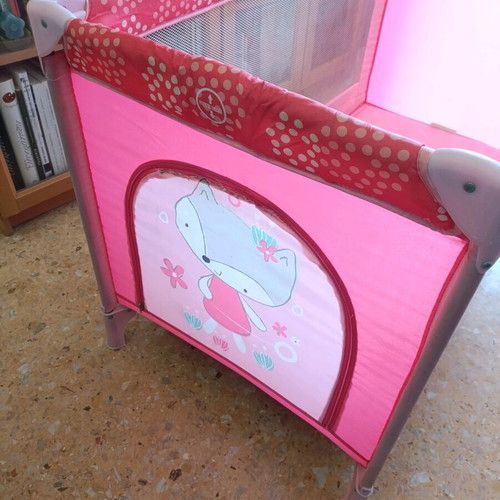 Pink baby playpen used