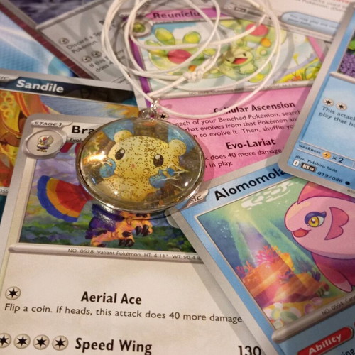 Pokemon necklace new, made with Pokemon card