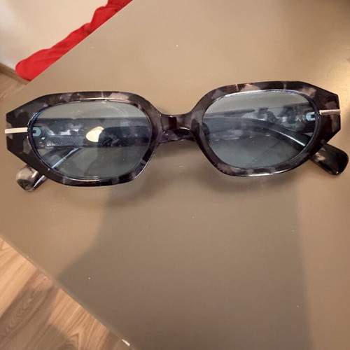 Glasses with blue transparent lens like new, turtle design