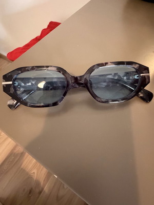 Glasses with blue transparent lens like new, turtle design