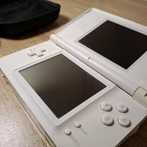 Nintendo DS Lite Polar White like new with charger and case