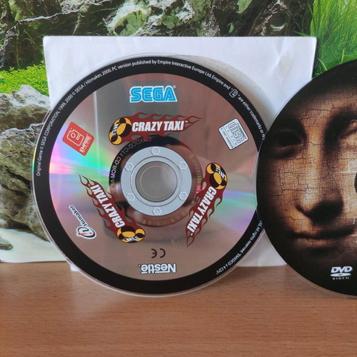 Crazy Taxi CD and National Geographic DVD The Truth in the Da Vinci Code like new