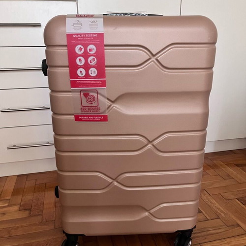 Suitcase new, unused, salmon color with lock and wheels
