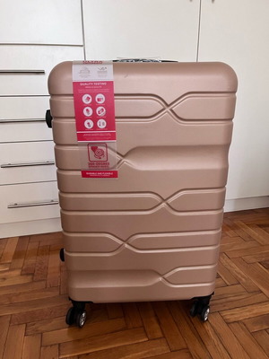 Suitcase new, unused, salmon color with lock and wheels