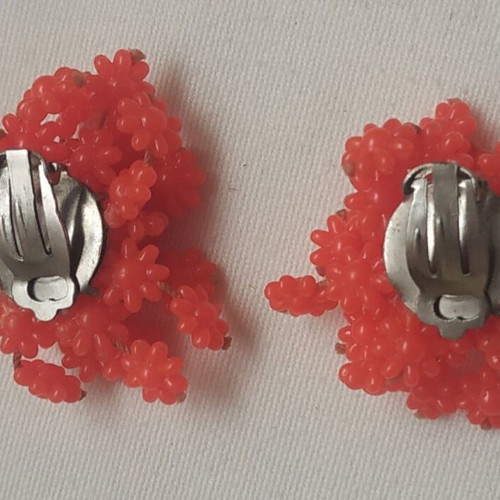 Clip-on earrings used, orange-red color