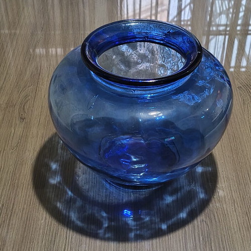 Blue glass vase, deep color and wide round shape