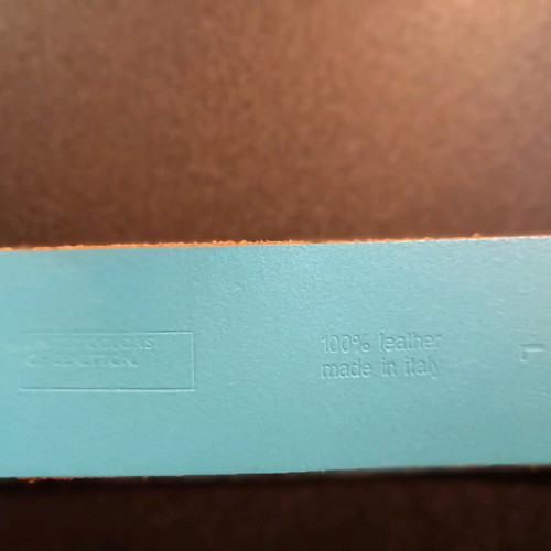 Three Benetton belts used, two leather and one fabric