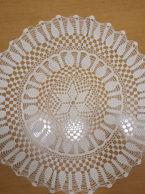 Handmade crochet doily in beige-ecru color like new