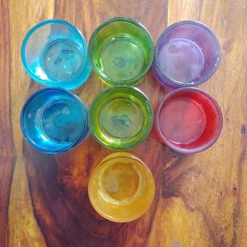 Colored tealight holders used, set of seven