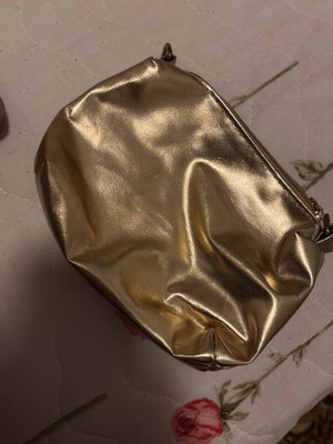 Wallet-neseser like new, gold color