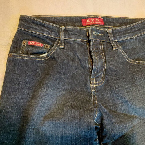 Dark blue jeans with silver bird design, like new, size S
