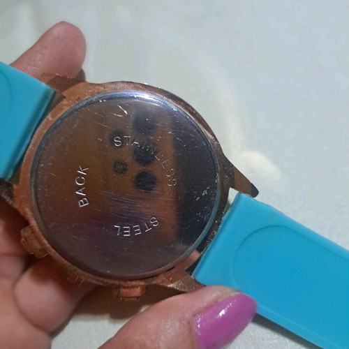 Women's watch used, rose gold with turquoise rubber strap