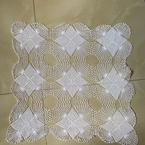 Handmade crocheted doily used with cotton thread