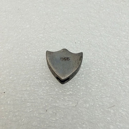 Silver 950 badge used with initials VG
