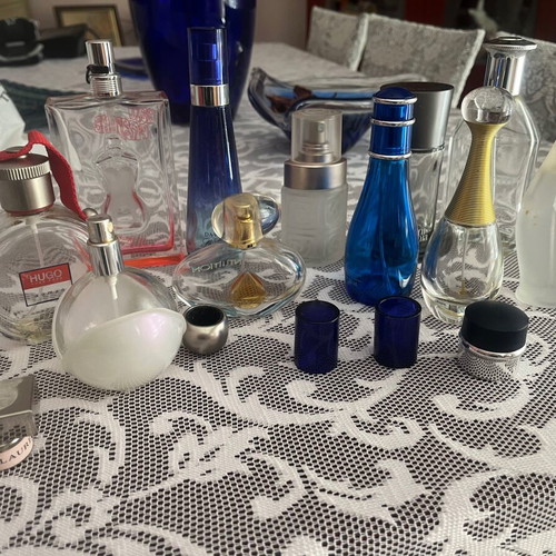 Empty bottles of famous perfumes like new for collection