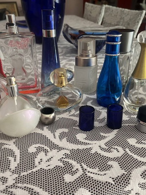 Empty bottles of famous perfumes like new for collection
