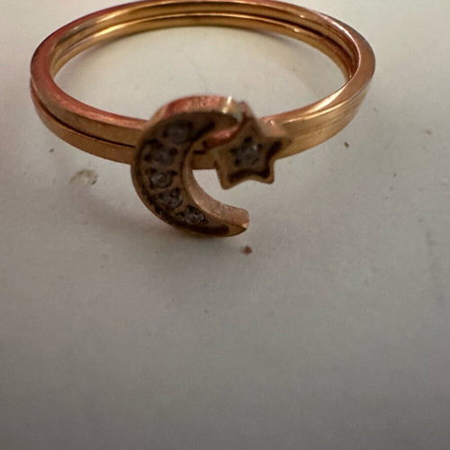 Steel rings like new, star and moon design, gold color, set of 2