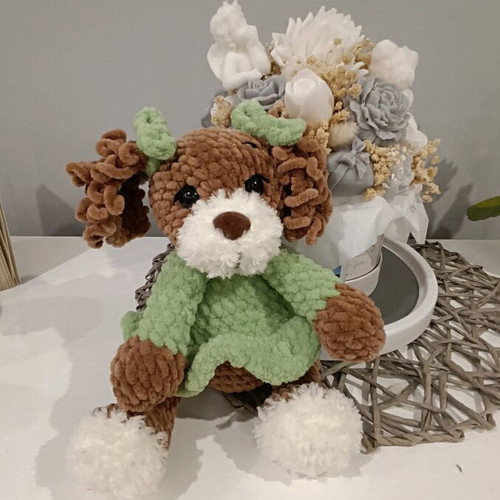 Handmade crocheted dog new with plush yarn and green dress