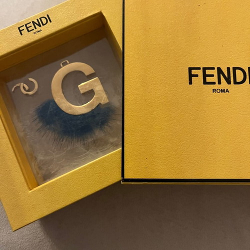 Fendi bag charm letter G with blue fur, like new
