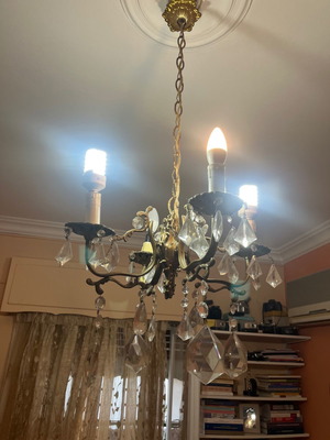 Bronze chandelier used with 4 candles and Bohemian crystals