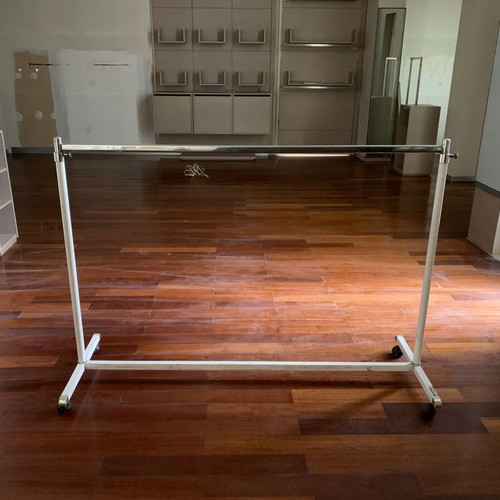 Metal clothes rack used, 155 cm width with adjustable height