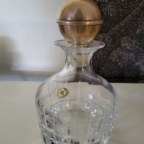 Crystal carafe used with forged silver stopper