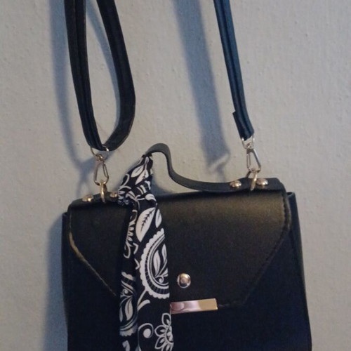 Shoulder bag new in black with gold details