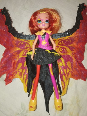 Doll like new with moving legs and wings