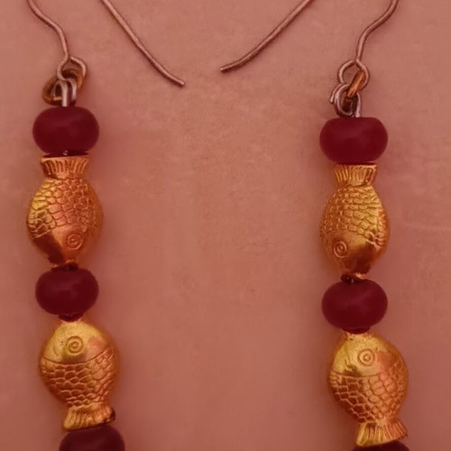 Earrings with fish design like new, gold tone