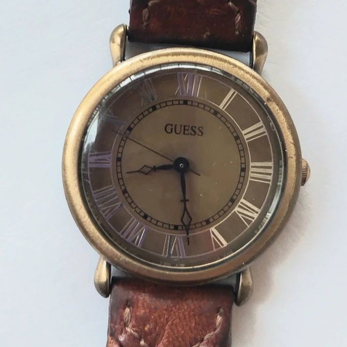 Guess women's vintage watch used with leather strap