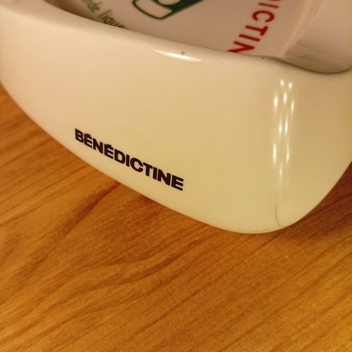 Collectible vintage ceramic ashtray with Benedictine logo used