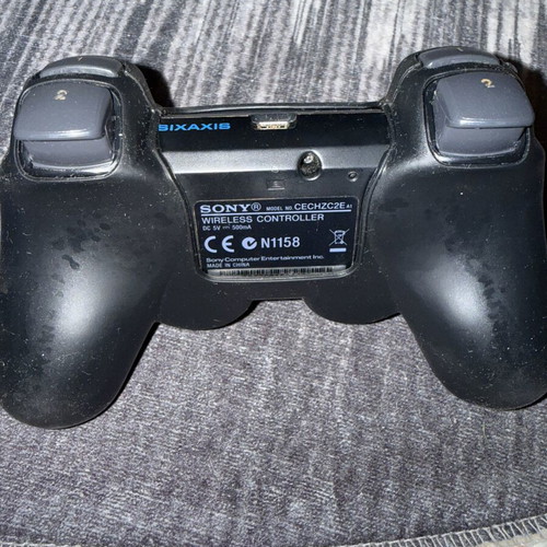 Sony PlayStation 3 Slim 160GB console used with original controller