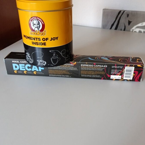 Espresso Decaf capsules and storage tin