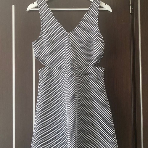 H&M dress used, black and white with discreet cutouts, size M