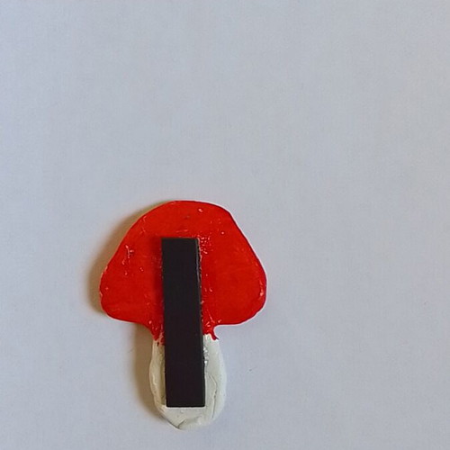 Handmade mushroom magnet from clay