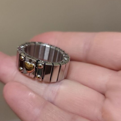 Silver ring with gold heart stainless steel new, size 8