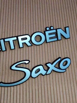Γνήσια σήματα πόρτα μπαγκαζ Citroen και Saxo για Saxo '96-'04, σαν καινούργιο
