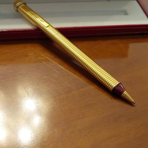 Must de Cartier gold plated ballpoint pen used with original box