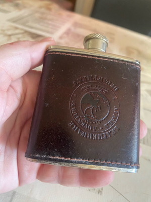 Flask used with leather cover featuring Alaska theme