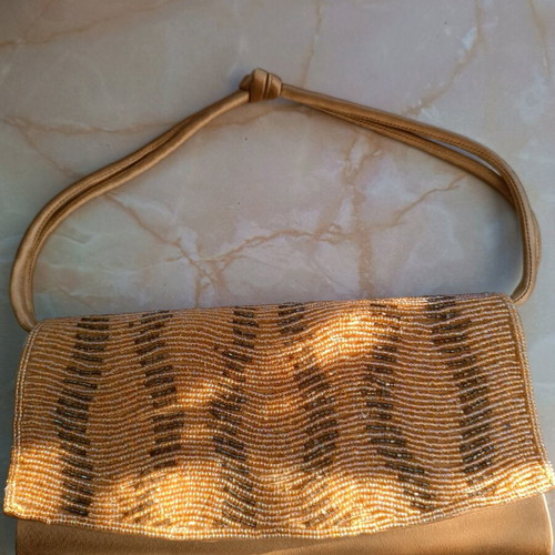 Gold beaded hand bag like new