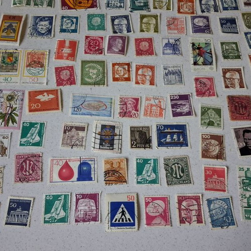 German stamps used, pack of 319 collectible vintage pieces