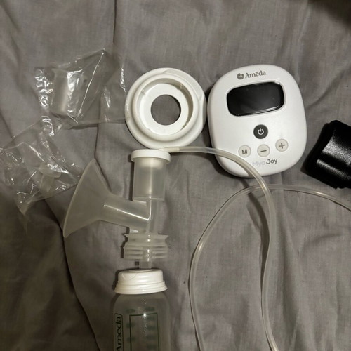 Ameda hospital breast pump like new with two flanges