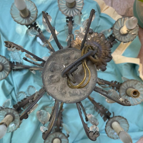 Antique chandelier used with bronze and crystal