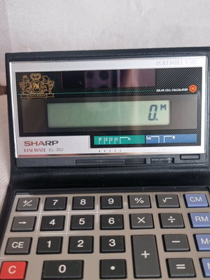Vintage Sharp Elsimate EL-352 calculator like new, Philip Morris Edition