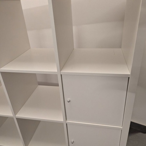 IKEA Kallax white shelving unit with 4 inserts