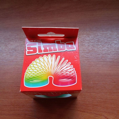 Collectible Slinky Simba spring toy 2000s new, sealed packaging