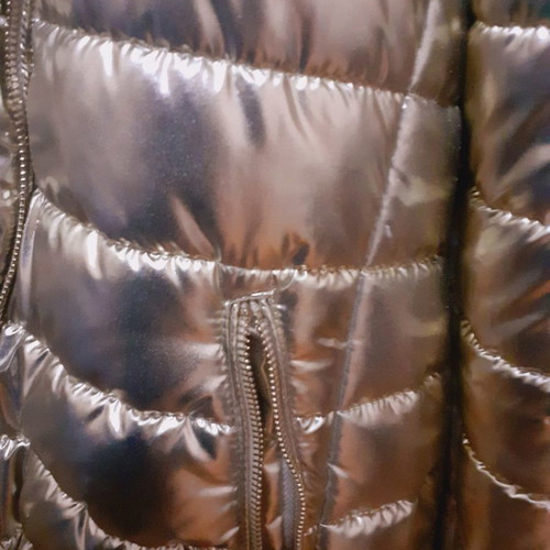 Short gold jacket with white fur and hood